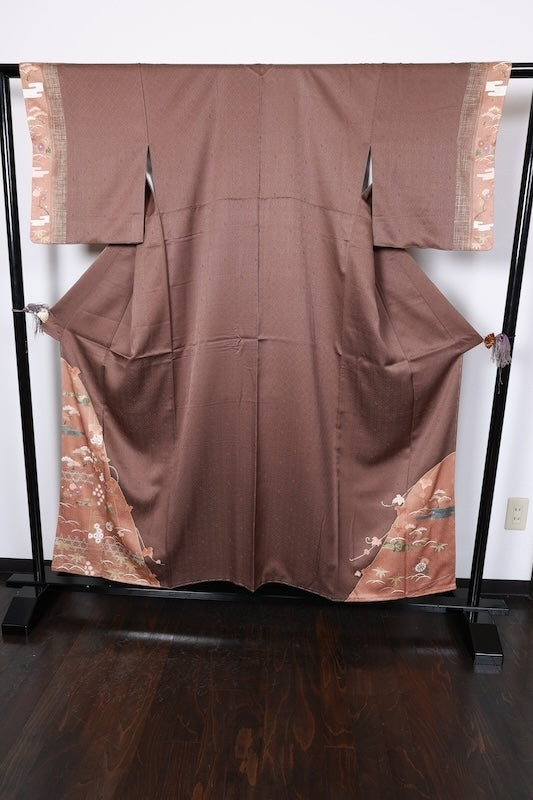 Japan kimono, brand new, unused. Features shades of brown, gold, green, purple, and white. Design includes pine trees, mist, flowers, and dewdrop grass. Hand-painted Kyoto Yuzen dyeing. (R70)