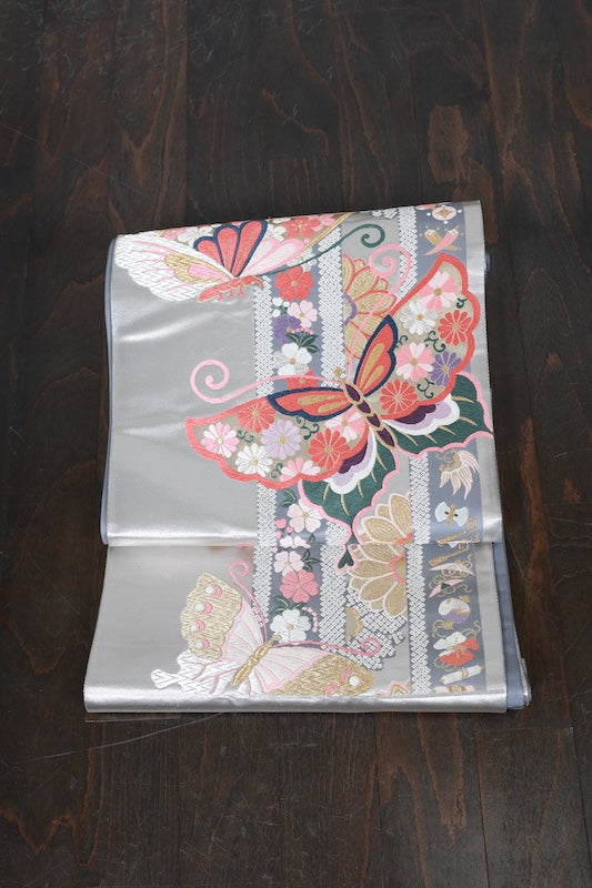 Brand new, unstitched fukuro obi (formal sash), Takashima Textile, silver, gold, shades of cherry blossom pink, purple, indigo, green, butterfly, cherry blossom, treasure motif, hikkuda pattern, R235