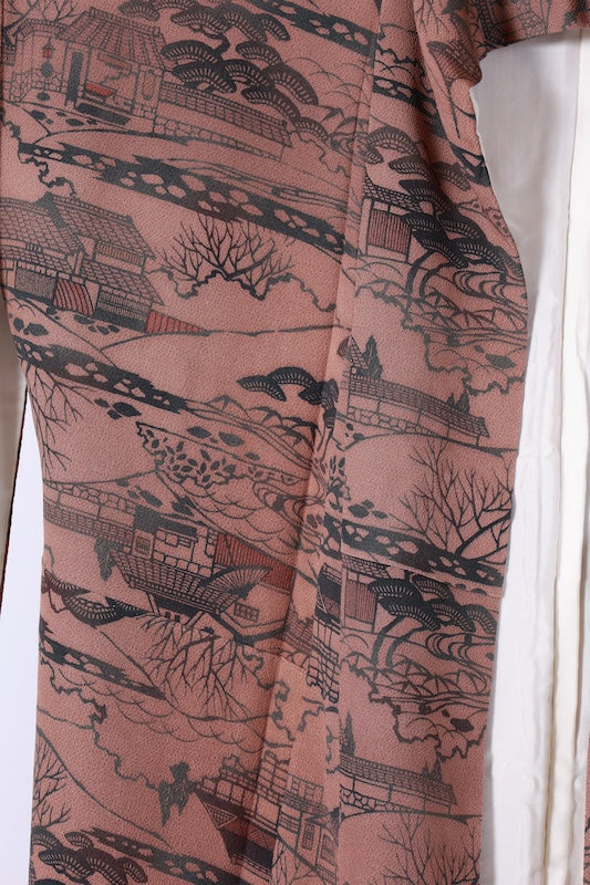 Edo Komon used (a type of traditional Japanese patterned kimono fabric) by Yukio Nanbu, featuring tool carvings, shades of brown, black, and purple, depicting a tea house scene. L33