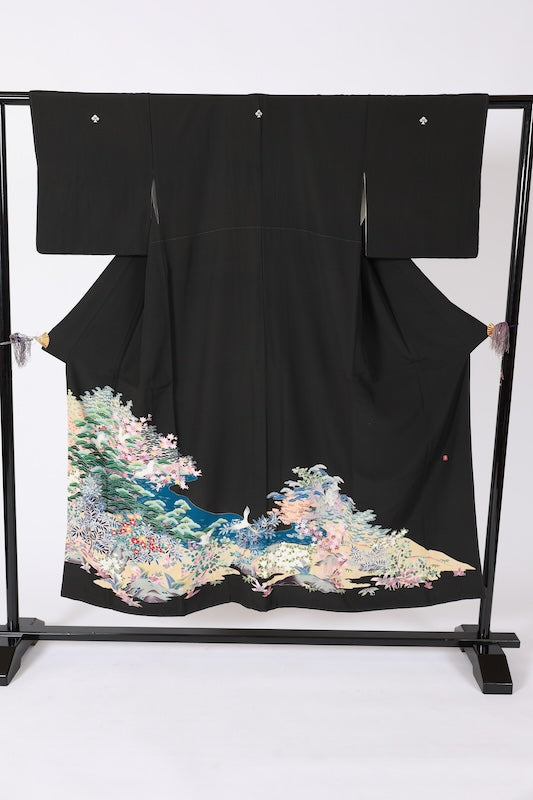 Black formal kimono used (Kurotomesode) with five crests, a hollyhock on the right, indigo, shades of green, purple, gray, and ochre, featuring cranes and a landscape design, Kyoto Kaga Yuzen dyeing, L44
