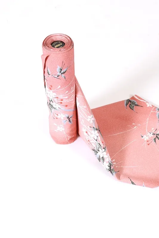 New, unstitched Komon fabric roll. Pink, white, gray, cherry blossom pattern. J31