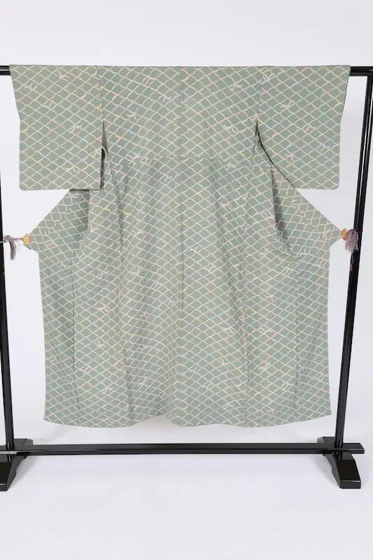 Japan used kimono fabric in green, purple, mustard yellow, gray, and coral yellow with an abstract pattern. B1468
