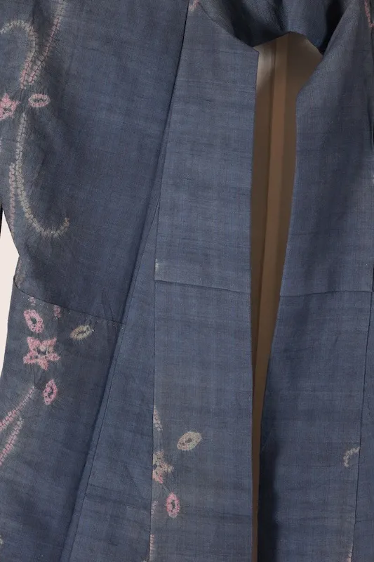 Tsumugi (Japan kimono) indigo and cherry-blossom pink; *nuitori-shibori* (stitched resist-dyeing) and *boshi-shibori* (capped resist-dyeing); abstract pattern; K327.