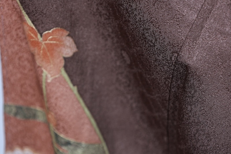 Japan kimono, brand new, unused. Features shades of brown, gold, green, purple, and white. Design includes pine trees, mist, flowers, and dewdrop grass. Hand-painted Kyoto Yuzen dyeing. (R70)