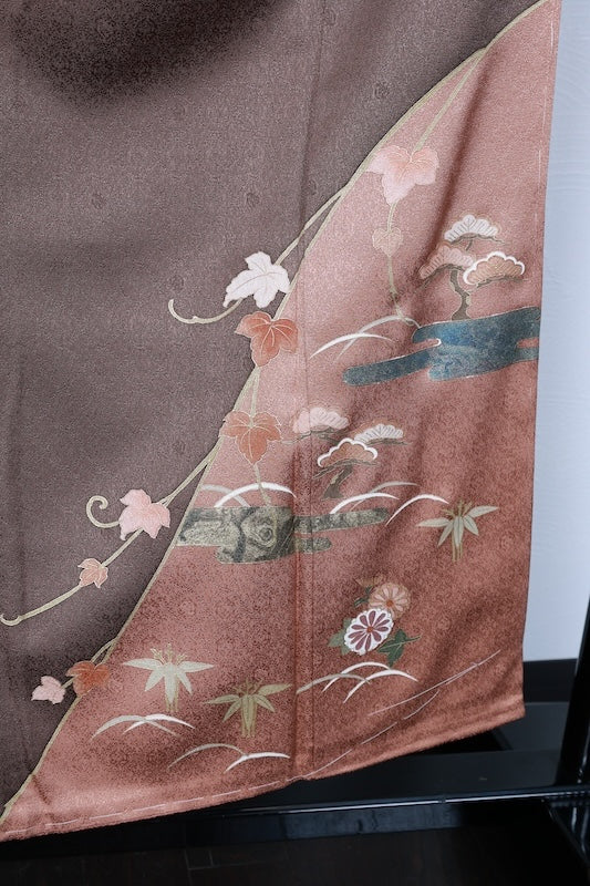 Japan kimono, brand new, unused. Features shades of brown, gold, green, purple, and white. Design includes pine trees, mist, flowers, and dewdrop grass. Hand-painted Kyoto Yuzen dyeing. (R70)