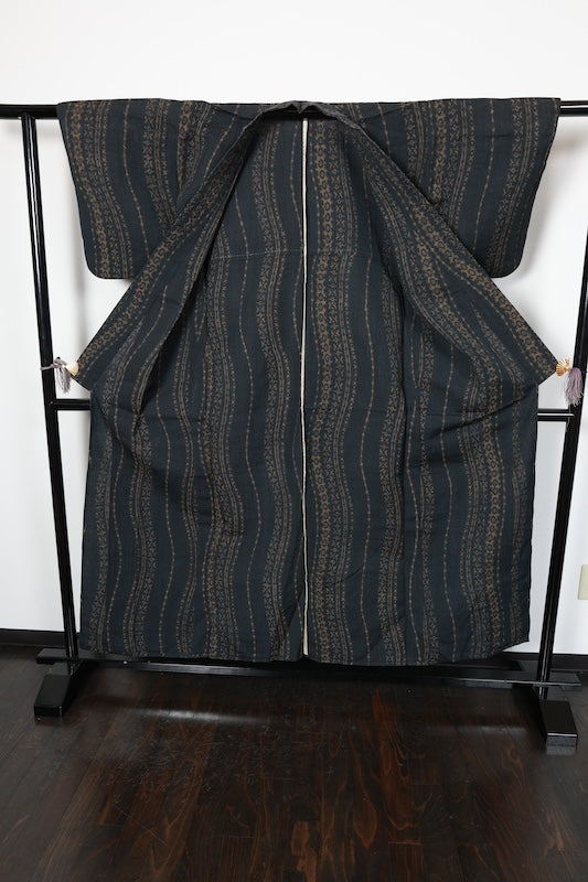 Tsumugi silk(Japan used kimono fabric), ink black, brown, ikat pattern, wavy stripes, R181