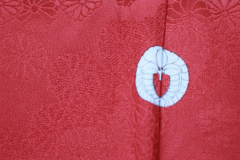 Japan used kimono fabric, red, with chrysanthemum pattern throughout, single crest, wisteria design, R188