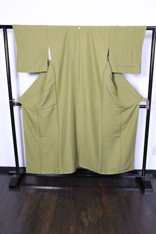 Japan kimono, brand new, unused, matcha green, raised weave, single crest of three geese in a circle, R212