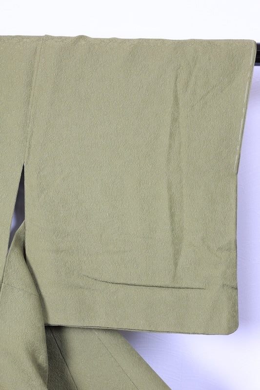 Japan kimono, brand new, unused, matcha green, raised weave, single crest of three geese in a circle, R212