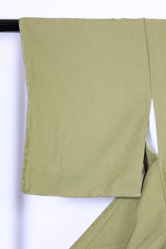 Japan kimono, brand new, unused, matcha green, raised weave, single crest of three geese in a circle, R212