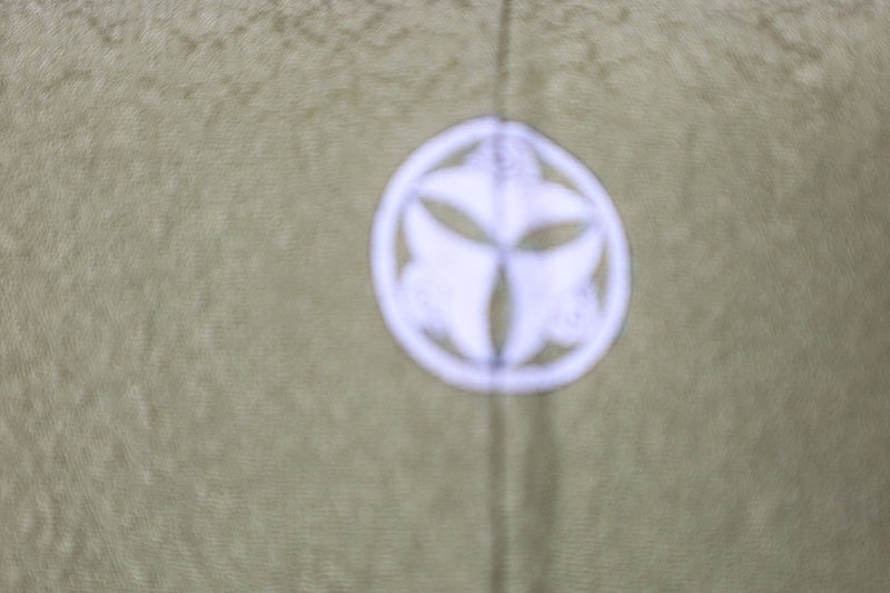 Japan kimono, brand new, unused, matcha green, raised weave, single crest of three geese in a circle, R212