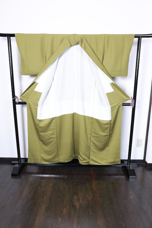 Japan kimono, brand new, unused, matcha green, raised weave, single crest of three geese in a circle, R212