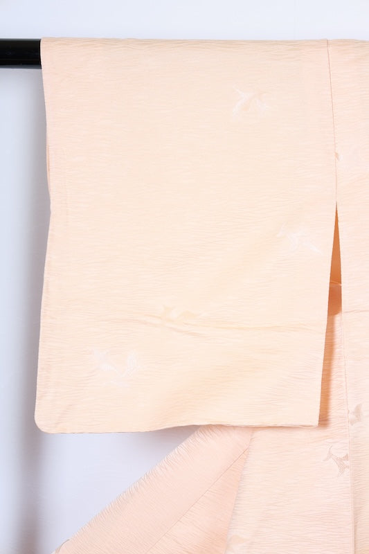 Japan  kimono, brand new, unused. Reddish-brown color with a continuous wave pattern, geometric design, embroidery, and a single butterfly crest (R256).