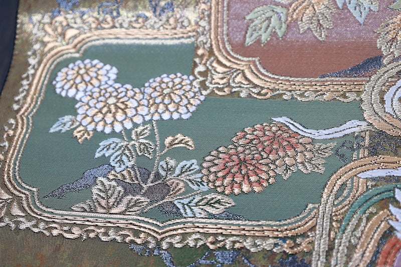New, unstitched fukuro obi (formal sash). Gold, purple, black, and white. Features phoenixes, butterflies, and flowers. R231