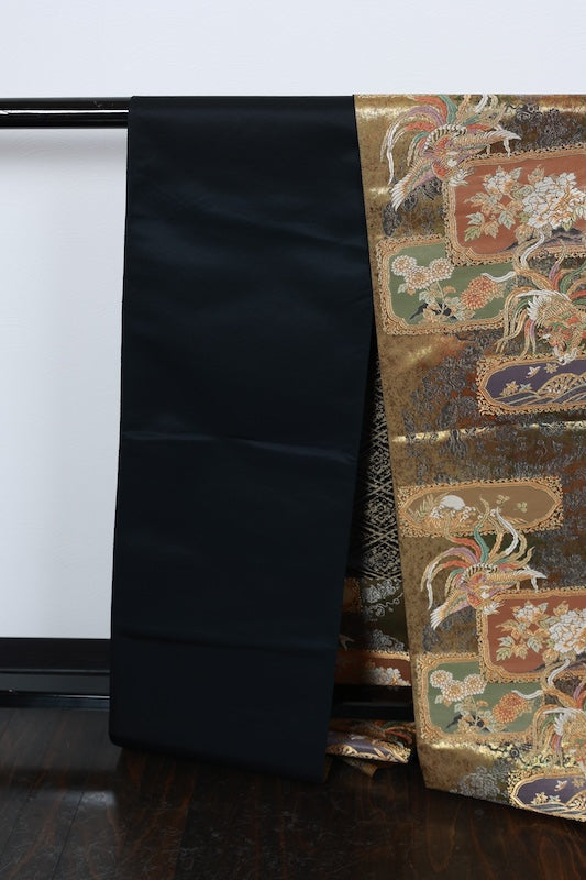 New, unstitched fukuro obi (formal sash). Gold, purple, black, and white. Features phoenixes, butterflies, and flowers. R231