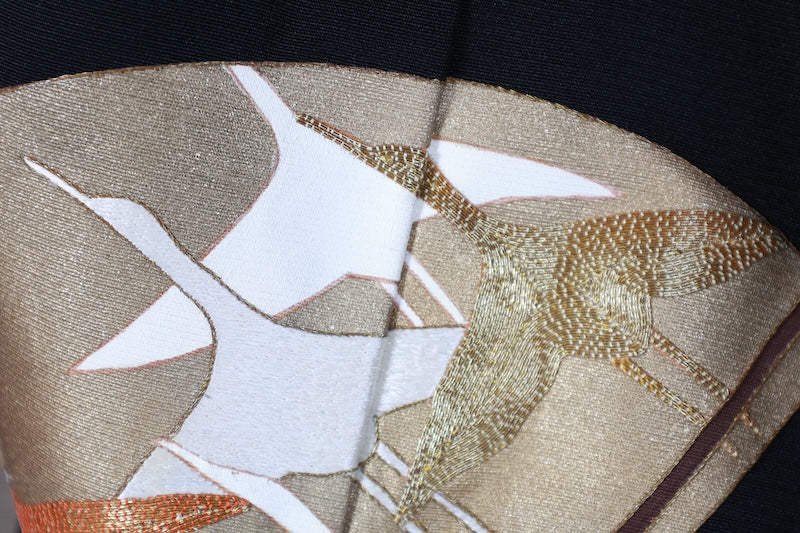 New, unused formal kimono (Tomesode). Black, gold, white, and gray. Rinpa style. Features include waves, fans, plum blossoms, chrysanthemums, grapes, maple leaves, and gold thread embroidery. Kyoto Yuzen dyeing. B1470