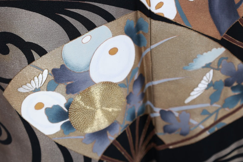 New, unused formal kimono (Tomesode). Black, gold, white, and gray. Rinpa style. Features include waves, fans, plum blossoms, chrysanthemums, grapes, maple leaves, and gold thread embroidery. Kyoto Yuzen dyeing. B1470