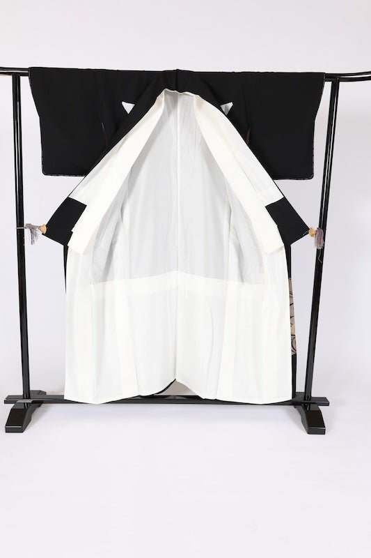 New, unused formal kimono (Tomesode). Black, gold, white, and gray. Rinpa style. Features include waves, fans, plum blossoms, chrysanthemums, grapes, maple leaves, and gold thread embroidery. Kyoto Yuzen dyeing. B1470