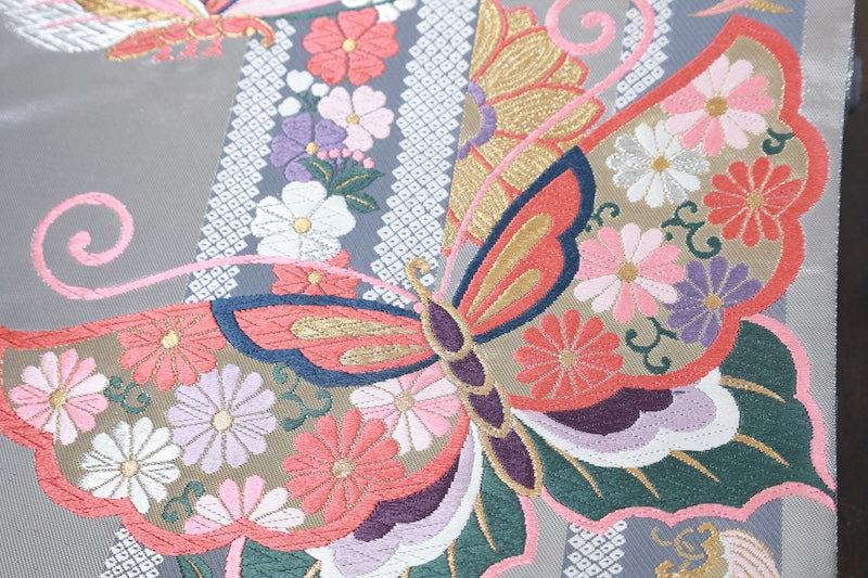 Brand new, unstitched fukuro obi (formal sash), Takashima Textile, silver, gold, shades of cherry blossom pink, purple, indigo, green, butterfly, cherry blossom, treasure motif, hikkuda pattern, R235