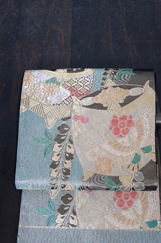 New, unstitched fukuro obi (formal sash). Gold, green, red, silver, blue. Features butterfly, peony, and thread spool motifs. R211