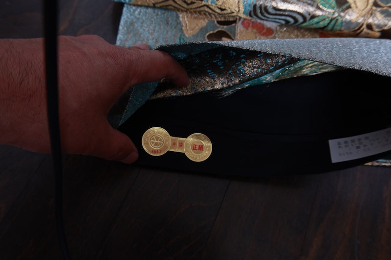 New, unstitched fukuro obi (formal sash). Gold, green, red, silver, blue. Features butterfly, peony, and thread spool motifs. R211