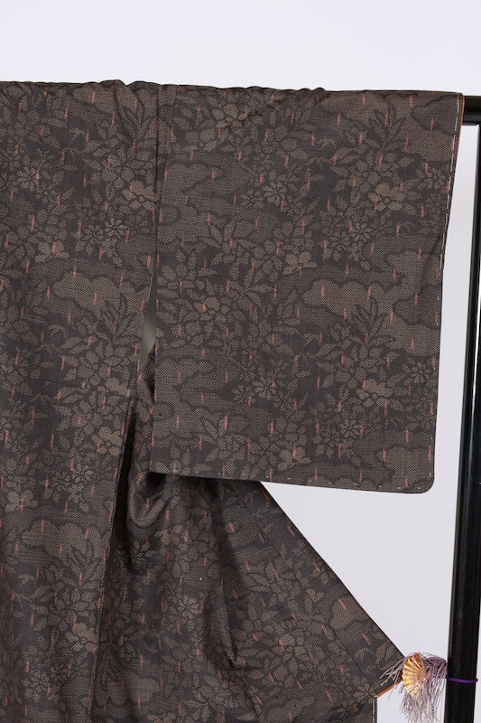 Yuki Tsumugi silk kimono, brand new and unused. Features shades of brown, reddish-brown, floral and cloud patterns, handwovenB1483