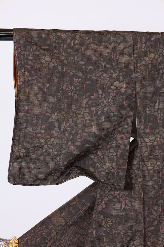 Yuki Tsumugi silk kimono, brand new and unused. Features shades of brown, reddish-brown, floral and cloud patterns, handwovenB1483