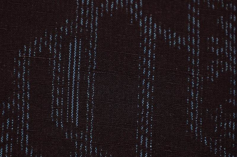 Ishige Yuki Tsumugi silk kimono, brand new and unused, in shades of indigo, with floral and geometric patterns.B1480