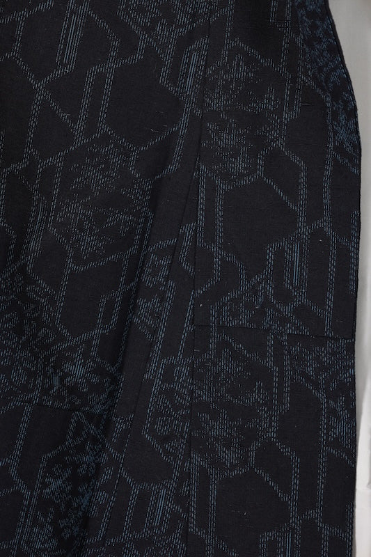 Ishige Yuki Tsumugi silk kimono, brand new and unused, in shades of indigo, with floral and geometric patterns.B1480