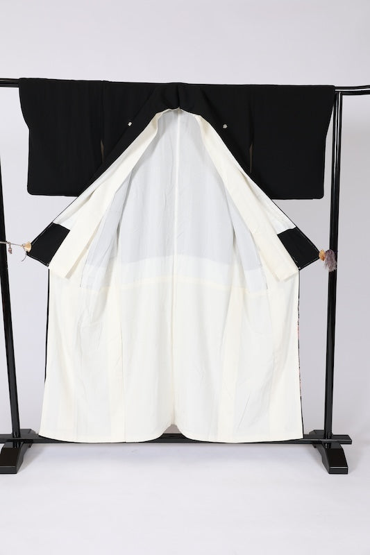 Black formal kimono used (Kurotomesode) in purple, yellow, vermilion, green, white, and cherry blossom pink, featuring a fan and flower design. Kyoto Kaga Yuzen dyeing technique, by a renowned artist. J6