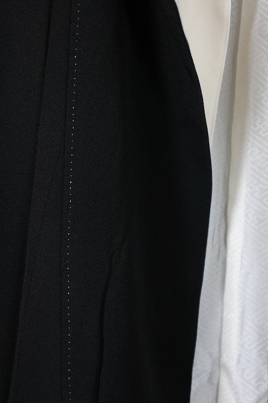 Black formal kimono used (Kurotomesode) in purple, yellow, vermilion, green, white, and cherry blossom pink, featuring a fan and flower design. Kyoto Kaga Yuzen dyeing technique, by a renowned artist. J6