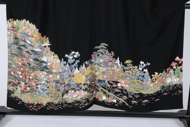Black formal kimono used (Kurotomesode), Kyoto Yuzen dyeing, coral, indigo, ochre, green, brown, pine, bamboo, camellia, garden, hand-painted, five crests (plum blossom), J13