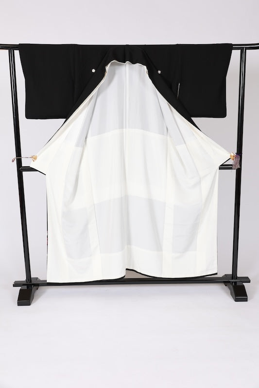 Black formal kimono used (Kurotomesode), Kyoto Yuzen dyeing, coral, indigo, ochre, green, brown, pine, bamboo, camellia, garden, hand-painted, five crests (plum blossom), J13