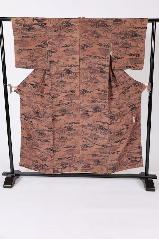 Edo Komon used (a type of traditional Japanese patterned kimono fabric) by Yukio Nanbu, featuring tool carvings, shades of brown, black, and purple, depicting a tea house scene. L33