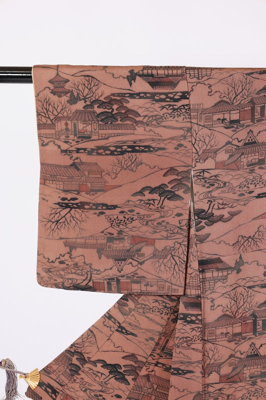 Edo Komon used (a type of traditional Japanese patterned kimono fabric) by Yukio Nanbu, featuring tool carvings, shades of brown, black, and purple, depicting a tea house scene. L33