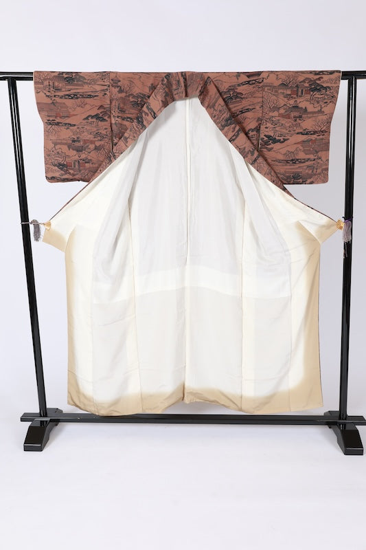 Edo Komon used (a type of traditional Japanese patterned kimono fabric) by Yukio Nanbu, featuring tool carvings, shades of brown, black, and purple, depicting a tea house scene. L33