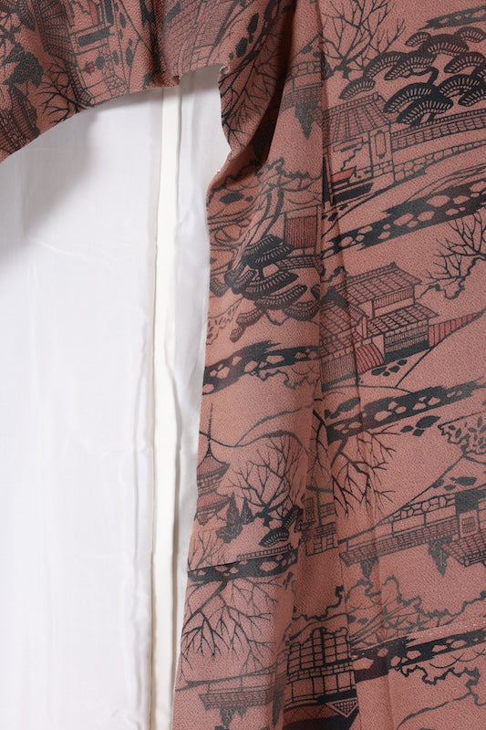 Edo Komon used (a type of traditional Japanese patterned kimono fabric) by Yukio Nanbu, featuring tool carvings, shades of brown, black, and purple, depicting a tea house scene. L33
