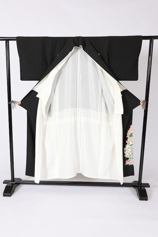 Black formal kimono　used (Kurotomesode) with five crests, a hollyhock on the right, indigo, shades of green, purple, gray, and ochre, featuring cranes and a landscape design, Kyoto Kaga Yuzen dyeing, L44