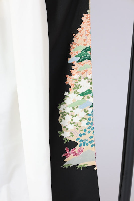 Black formal kimono　used (Kurotomesode) with five crests, a hollyhock on the right, indigo, shades of green, purple, gray, and ochre, featuring cranes and a landscape design, Kyoto Kaga Yuzen dyeing, L44