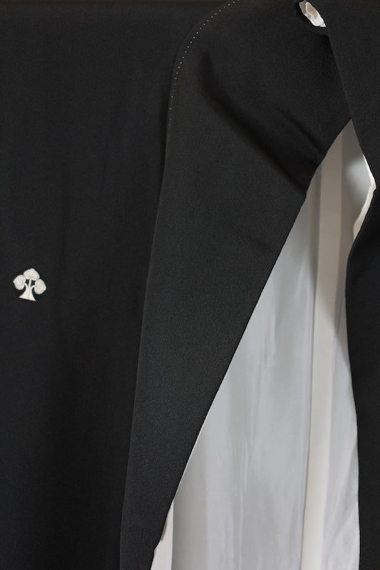 Black formal kimono　used (Kurotomesode) with five crests, a hollyhock on the right, indigo, shades of green, purple, gray, and ochre, featuring cranes and a landscape design, Kyoto Kaga Yuzen dyeing, L44