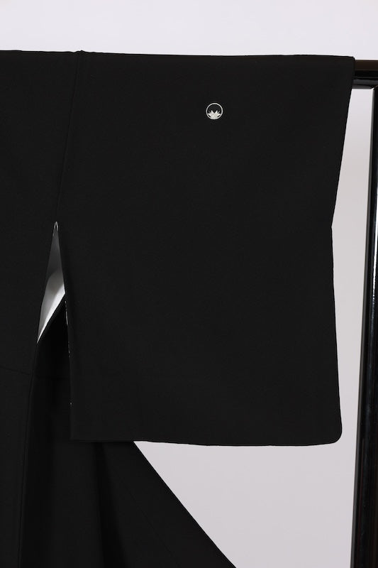 Black formal kimono used(Kurotomesode) with five crests of overlapping arrows in a circle, in shades of yellow-green, purple, indigo, coral, and white, depicting a seaside landscape, by a renowned artist, Kyoto Kaga Yuzen dyeing technique, L47