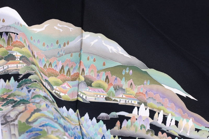 Black formal kimono used(Kurotomesode) with five crests of overlapping arrows in a circle, in shades of yellow-green, purple, indigo, coral, and white, depicting a seaside landscape, by a renowned artist, Kyoto Kaga Yuzen dyeing technique, L47
