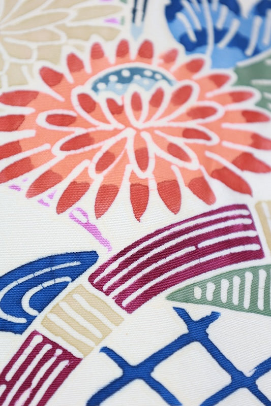 Nagoya obi used (sash), Bingata style, by a renowned artist, in off-white, indigo, green, brown, gray, blue, featuring floral, wave, and bamboo fence motifs, hand-dyed, stencil-dyed, L77