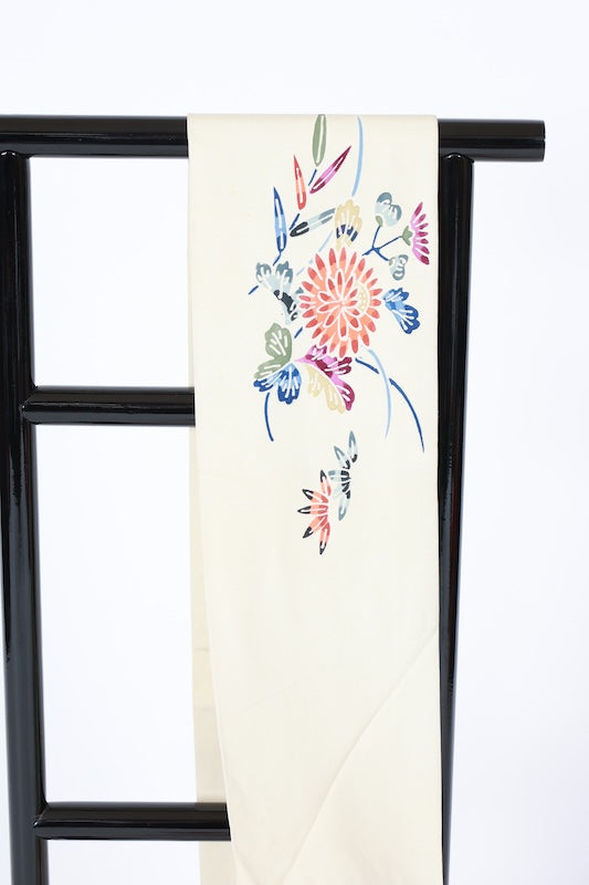 Nagoya obi used (sash), Bingata style, by a renowned artist, in off-white, indigo, green, brown, gray, blue, featuring floral, wave, and bamboo fence motifs, hand-dyed, stencil-dyed, L77