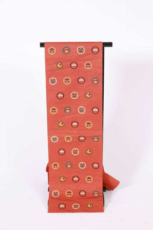 Nagoya obi used (sash), Hakata pattern weave, brick red, green, brown, purple, off-white, circle with bell motif, streamer design, scroll pattern, L121