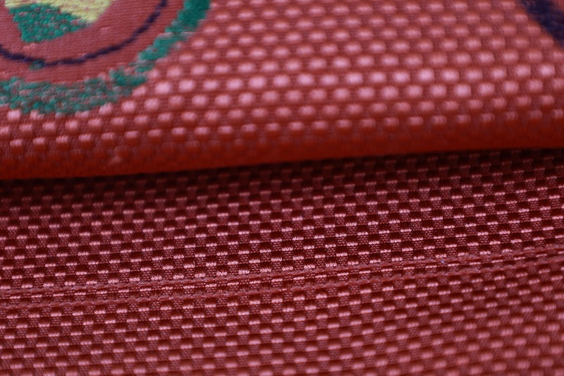 Nagoya obi used (sash), Hakata pattern weave, brick red, green, brown, purple, off-white, circle with bell motif, streamer design, scroll pattern, L121