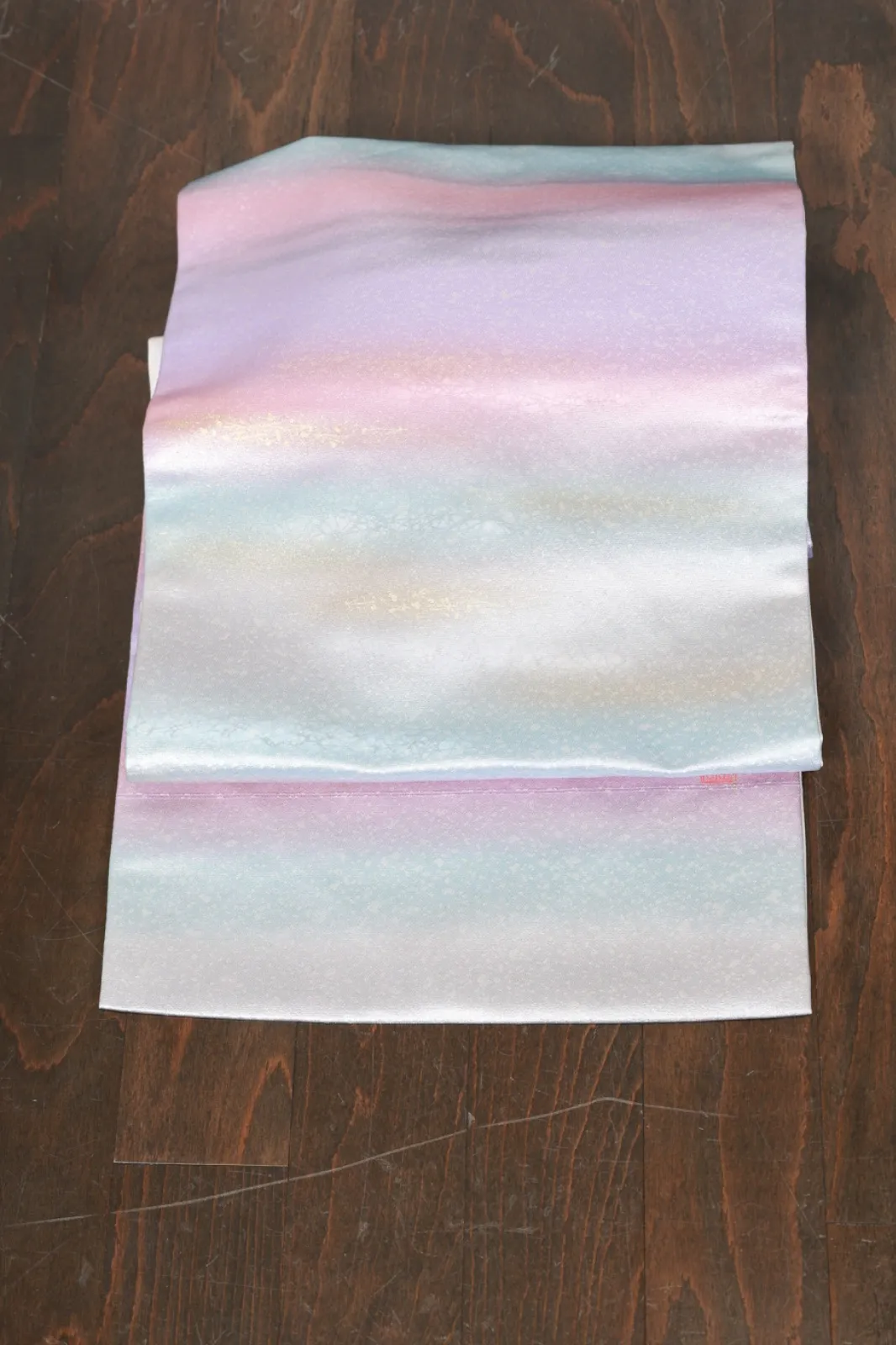 Nagoya Obi(used sash) – Blue, shades of purple, gray, silver, and gold; *hikihaku* (gold/silver leaf strip) technique – R124