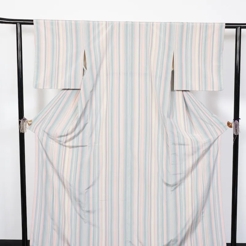 Japan used kimono fabric, shades of gray, orange, beige, indigo, and irregular stripes. T53