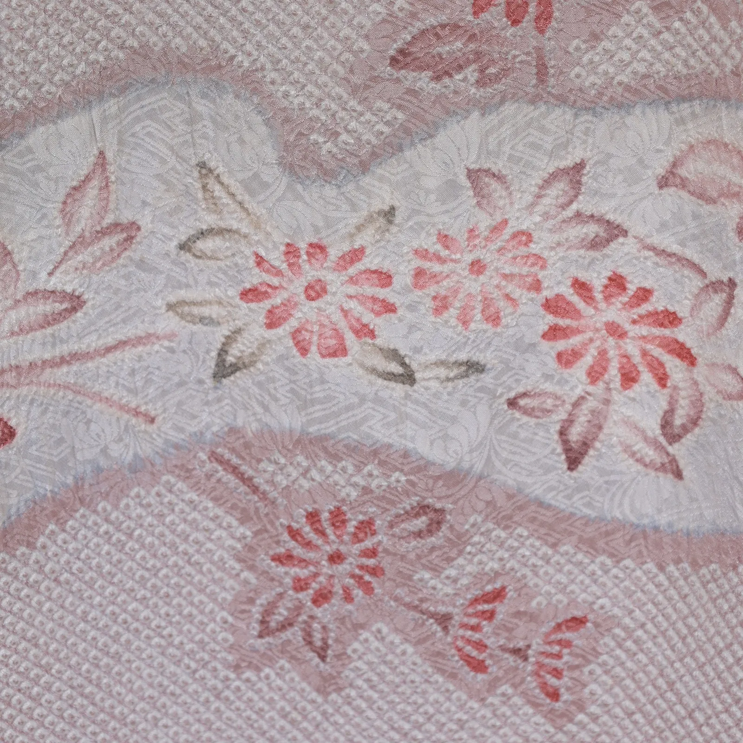 Brand new, unsewn *haori*  all-over *shibori* (tie-dye) in *hikitta* style; light brown with floral design / B006