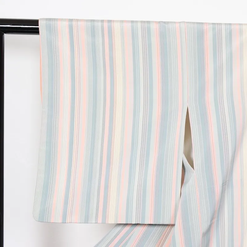 Japan used kimono fabric, shades of gray, orange, beige, indigo, and irregular stripes. T53